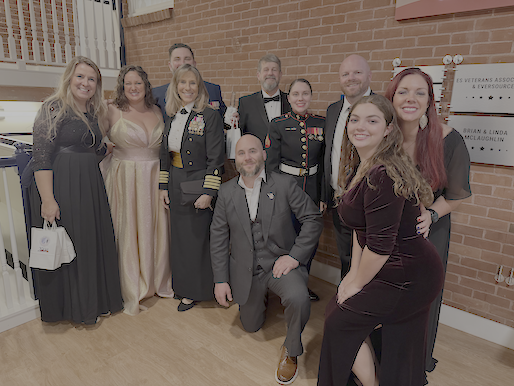 Captain Lynne Blankenbeker telling sea stories to all the Marines. 